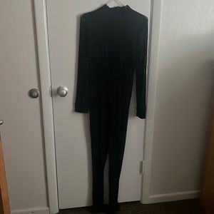 black sheer bodysuit with high neck